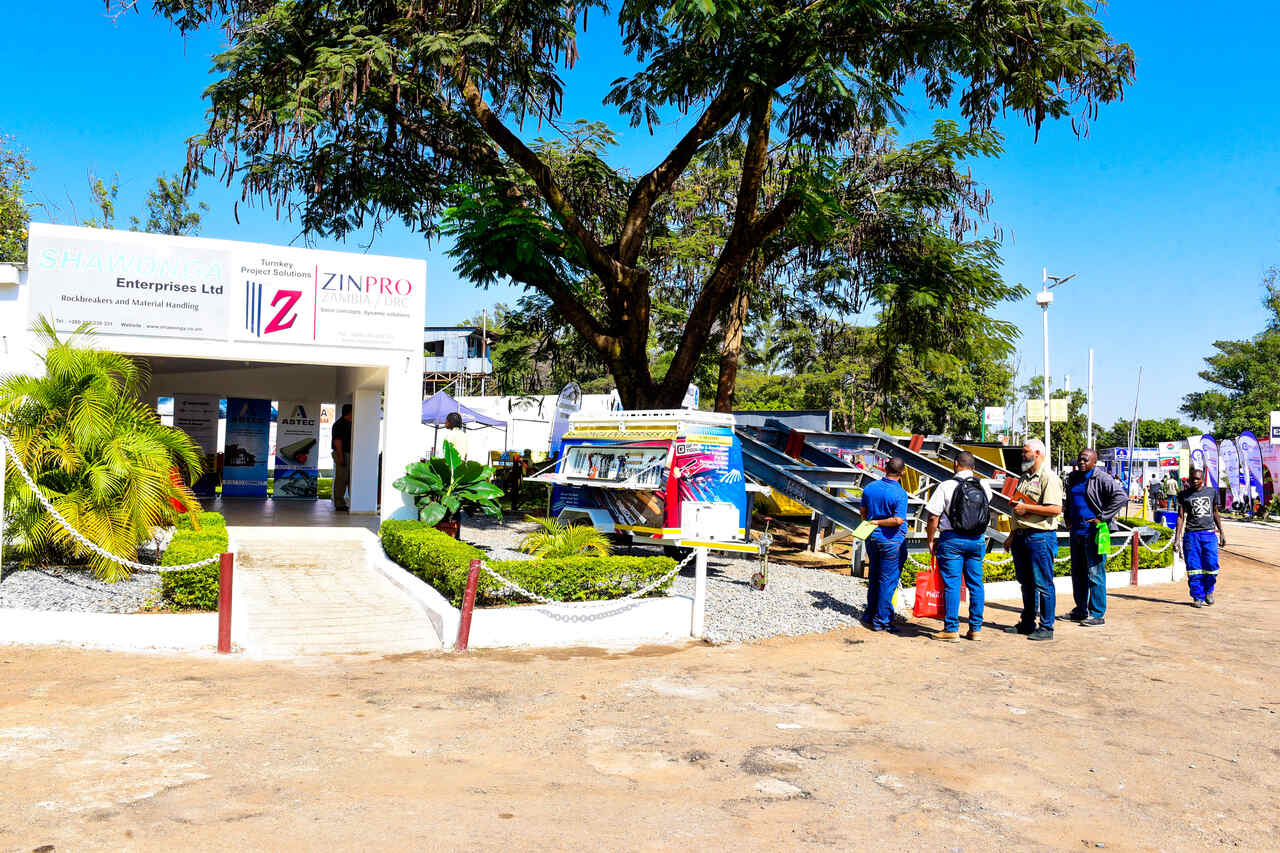 Exhibitors showcasing heavy machinery